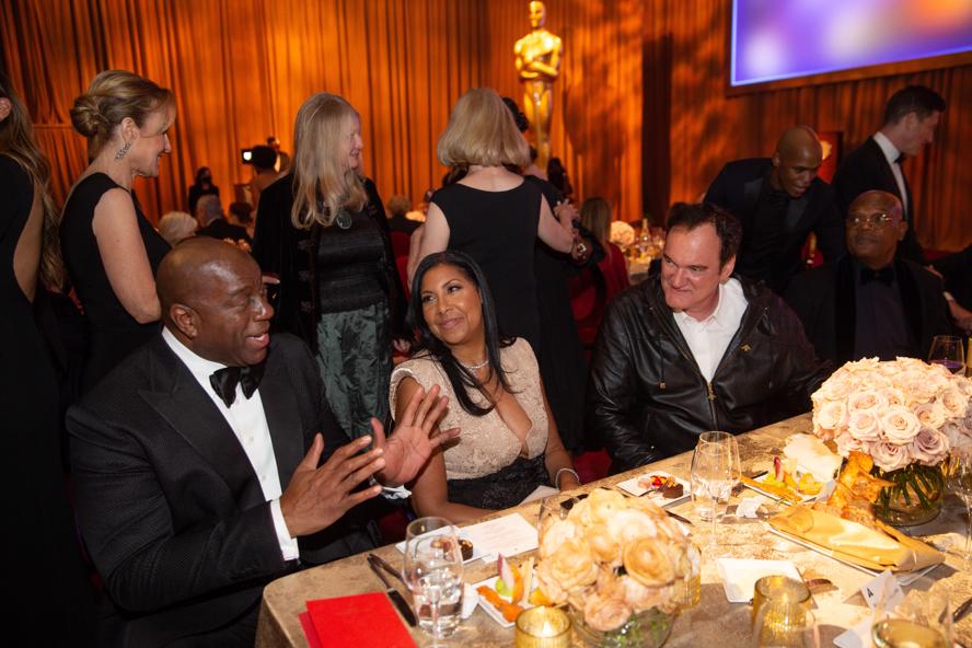 academy-awards---oscars-2022---immagini-Magic_Johnson,_Cookie_Johnson_and_Quentin_Tarantino_at_The_2022_Governors_Awards_in_The_Ray_Dolby_Ballroom_on_Friday,_March_25,_2022_at_Ovation_Hollywood,_CA..jpg